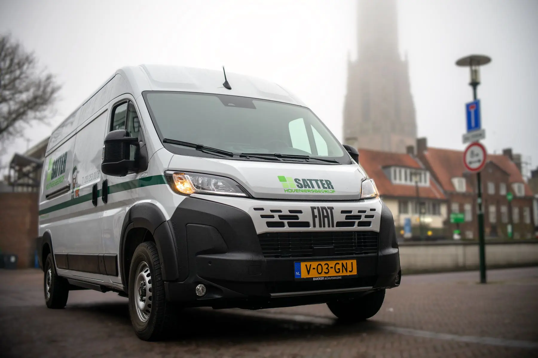 Bus van Amersfoorts hoveniersbedrijf Satter